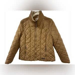 G.H. Bass & Co. women's quilted full-zip jacket in a camel. M. Watch VIDEO